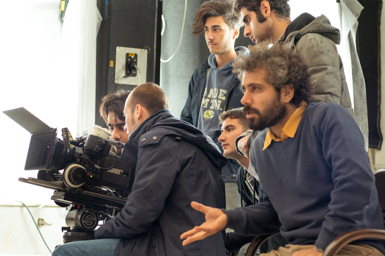 On set: the crew gathered around the camera